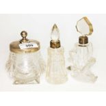 Three hallmarked silver topped jars/scent bottles.
