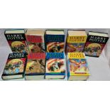 Nine Harry Pottery hard back books, comprising seven first editions including two copies of Half
