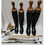 A box containing 2 pairs of vintage leather riding boots with wooden boot trees, vintage shoe
