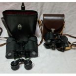 2 cased pairs of Carl Zeiss Jena Jenoptem binoculars, 8x30 w & 10x50 W. 10x50 w pair have damage