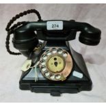 A vintage Siemans 323L pyramid telephone with copper dial.