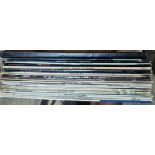A box of records, various artists, circa 1960s to 80s.
