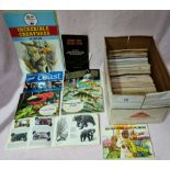 A box of assorted tea cards, various series.