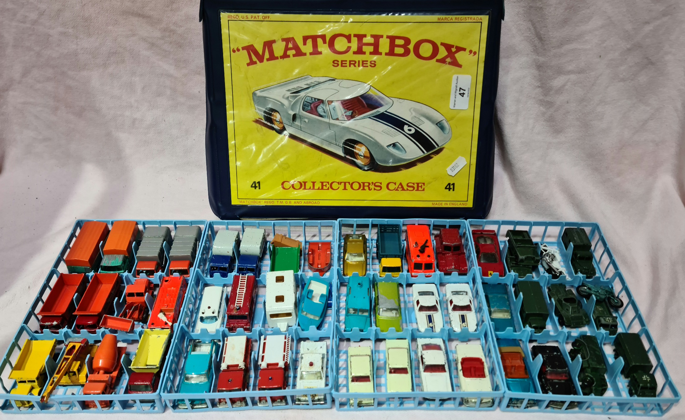 A Matchbox series collector's case with 4 trays of various vehicles.