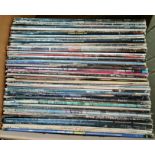 A box of approx. 60 classic rock LPs including Fleetwood Mac, Allman Bros, Wings, Roxy Music, Blue