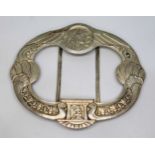 An Art Nouveau white metal buckle by Armand Bargas, circa 1900, monogrammed 'AB', length 85mm.