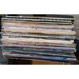 A box of records, 1970s and 80s including Meat Loaf, Fleetwood Mac, Cliff Richard etc.