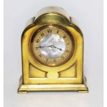 A brass eight day clock with mother of pearl dial, height 10.5cm.