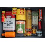 A collection of tins to include Bartoil lubricating oil, Holdtite tubeless tyre repair, Esso shock