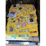 A tray of assorted Pokemon cards.