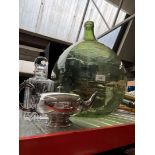 A large carboy, a silver plated tea / coffee pot and a cut glass decanter.