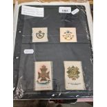 A collection of 18 vintage regimental silk badges.