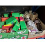 Two boxes of model cars and dolls, etc.