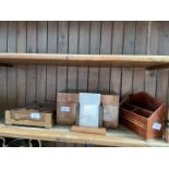 A wooden sewing box together with another box with lid, a desk tidy and a wooden photo frame.
