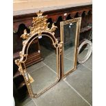 A modern Venetian style gilt framed mirror, 120cm x 64cm and another gilt framed mirror.
