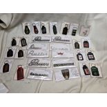 A box of vintage motor scripts & keyrings