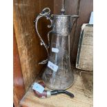 An etched glass claret jug with plated handle and top and a gentleman's pipe by K&P Peterson's.