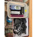 A selection of vintage telephones and other related items including chargers, etc.