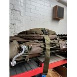 A Trakker Deluxe version sleeping bag on frame.