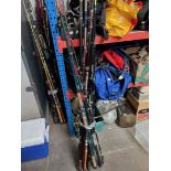 A bundle of approx 12 sea fishing rods.