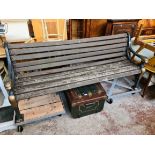 A cast metal and wood garden bench, length 195cm
