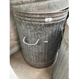 A galvanised dust bin - no lid.