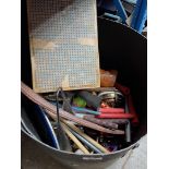 A drum case containing assorted percussion instruments.