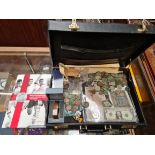 A briefcase containing detector finds, coins, England Football medals 2004 etc