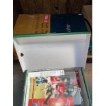 Three boxes of Manchester United football programs, aways 1966-1988 and homes 1971-2011.