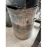 A galvanised dust bin