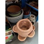 Six pottery planters and 2 multipot planters