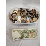 A tub of world coins