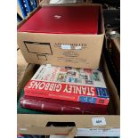 2 boxes of stamp albums and catalogues