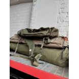 A fishing bivvy and 2 holdalls / carry bags.