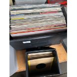 A box of records including The Beatles, The Beach Boys, Mike Oldfield etc and a box of 45s including
