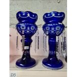 Pair of blue glass lustre drop vases.