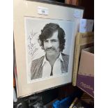 A framed Alan Bates signed photograph.