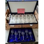 A boxed set of Royal Doulton crystal wine glasses and a boxed set of Italian wine glasses.