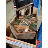 A cuckoo clock and a mid 20th century Metamec mantle clock.