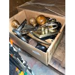 A box of rim locks and switches and a box of door handles, door knockers, locks, etc.