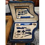 A vintage manicure set in musical piano case.
