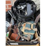 A box and a bag of cameras, and accessories to include Cannon AT-1 with cannon lense, Ricoh,