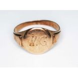 A yellow metal signet ring, monogrammed 'W.G', wt. 3.5g. Size R