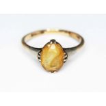 An early 20th century citrine set ring, marked '9CTGOLD', gross wt. 2.1g, size N.