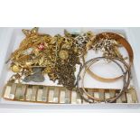 A tray of assorted mainly yellow metal jewellery.