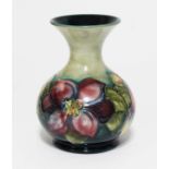 A Moorcroft pottery vase decorated in Anemone pattern, impressed and painted marks, height 12.5cm.