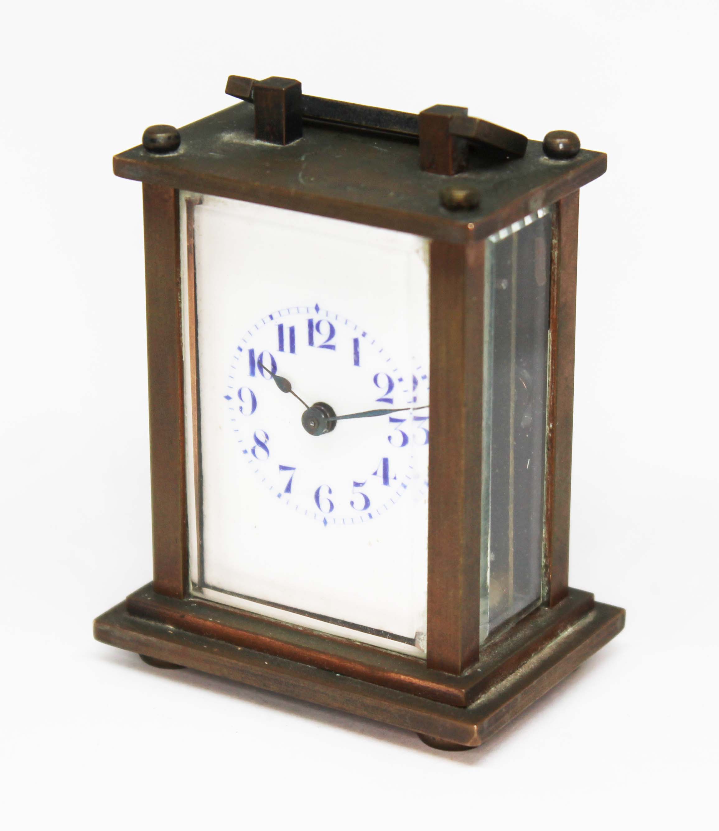 An early 20th century miniature brass carriage clock, height 8cm.