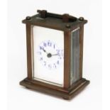 An early 20th century miniature brass carriage clock, height 8cm.