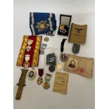 A box of masonic and militaria items including medals, badges, sashes, Polish driving