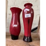 A pair of Caithness Ebony glass vases. Height 22.5 cm and 25.5 cm.